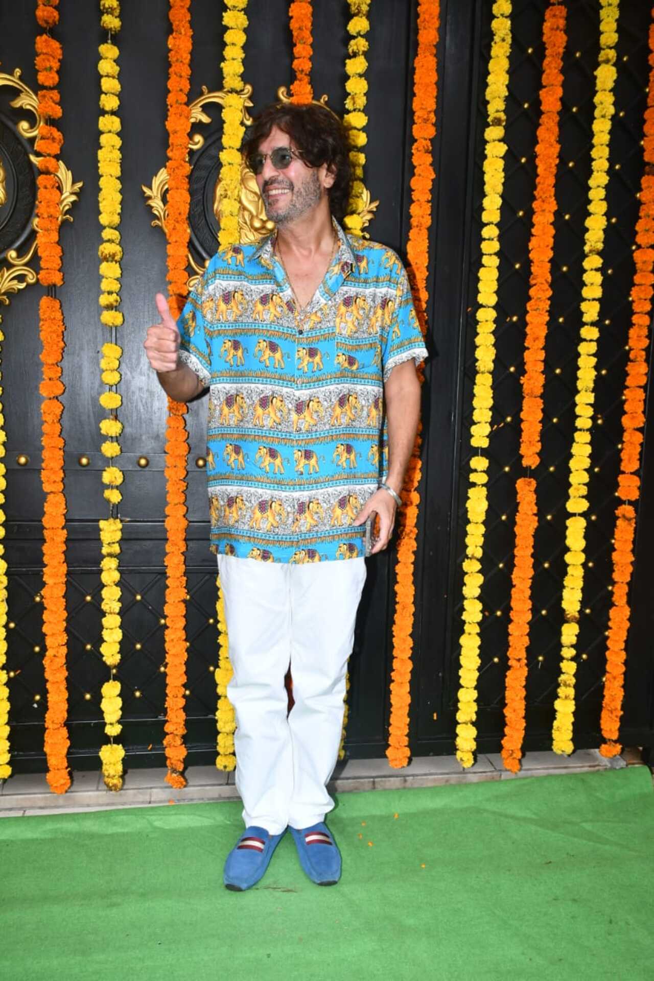 Apart from him, Chunky Panday also arrived at Ektaa's residence. He was seen sporting a quirky look. 